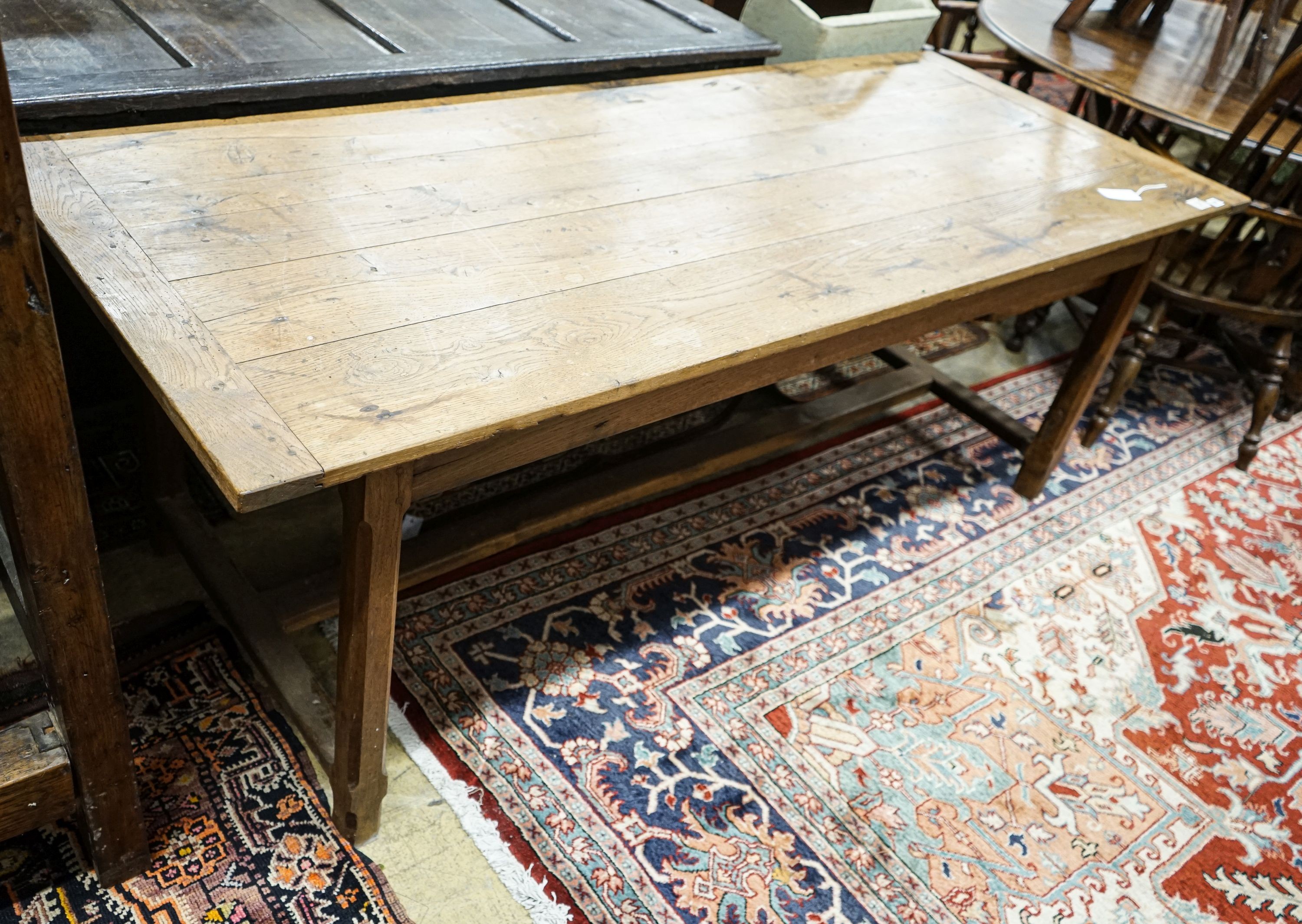 A Cotswold style oak and pine refectory table, with single pine drawer to one end, width 203cm, depth 80cm, height 73cm